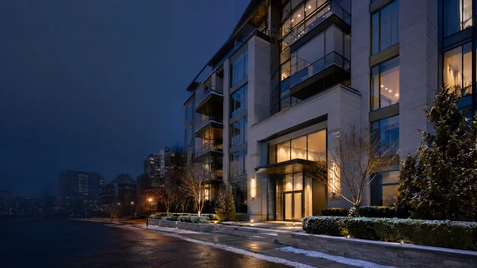 Contemporary Canadian residential property at blue hour with a light winter streetscape